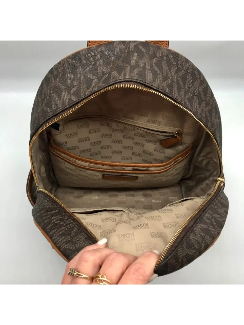 Michael Kors Brown Coated Canvas  Medium Abbey Backpack